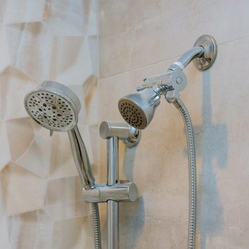 Contemporary bathroom with shower heads white bathroom shower wall